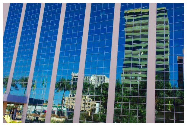 Reflections in glass covered skyscrappers