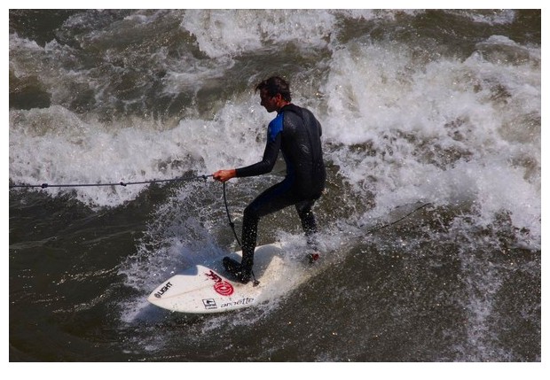 Austria, Graz, practicing windsurf in river