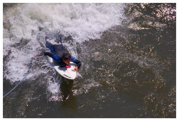 Austria, Graz, practicing windsurf in river