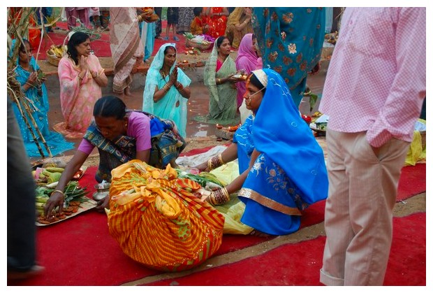 Women in blue sari, Chchath puja Delhi, India