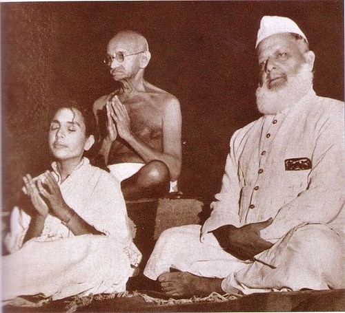 Mahatma Gandhi in a prayer meeting