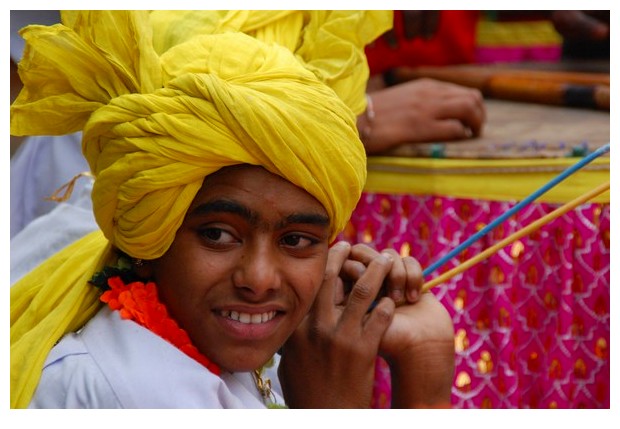 Guys wearing yellow turbans in Dilli Haat, Delhi, India