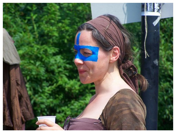 People with blue masks, summer festival Bologna