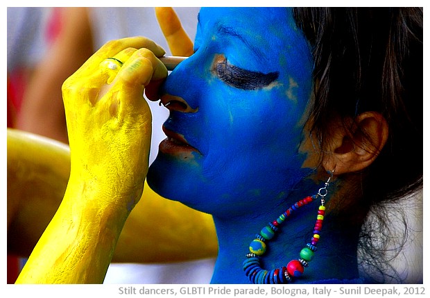 Colourful stilt dancers, Bologna Gay Pride parade, Italy - images by Sunil Deepak, 2012