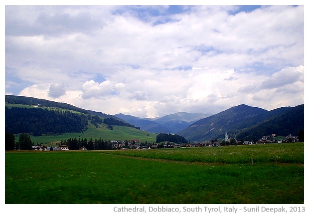 Cathedral and green roofed bell tower, Dobbiaco, Italy - images by Sunil Deepak, 2013