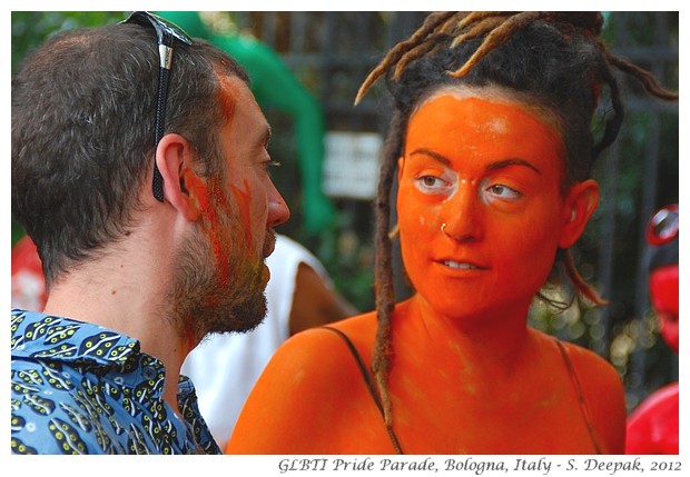 Saffron coloured stilt dancer, Bologna GLBTI pride parade - S. Deepak, 2012