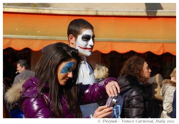 Painted faces at Venice carnival, Italy, February 2011