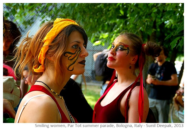 Smiling girls, Partot summer parade, Bologna, Italy - images by Sunil Deepak, 2013