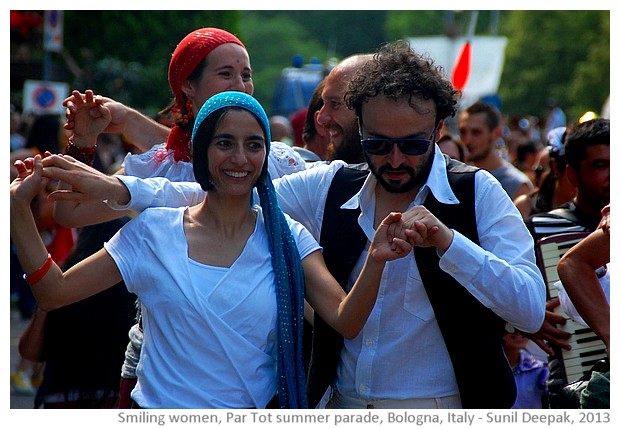 Smiling girls, Partot summer parade, Bologna, Italy - images by Sunil Deepak, 2013