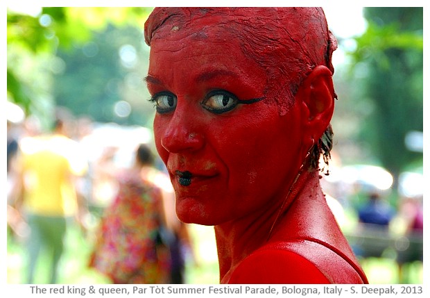 Red stilt dancers, Partot summer parade, Bologna, Italy - images by Sunil Deepak, 2013