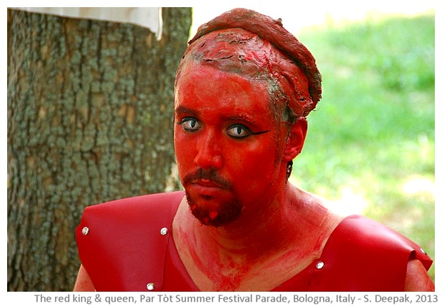 Red stilt dancers, Partot summer parade, Bologna, Italy - images by Sunil Deepak, 2013