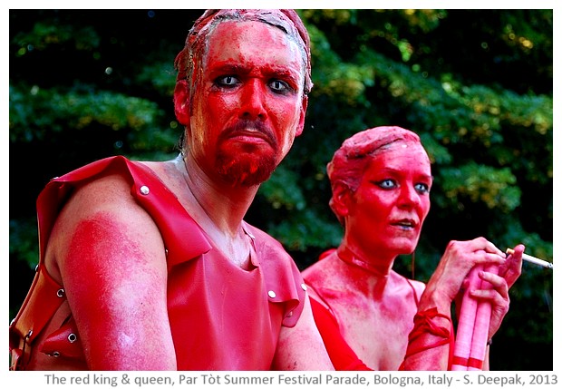 Red stilt dancers, Partot summer parade, Bologna, Italy - images by Sunil Deepak, 2013