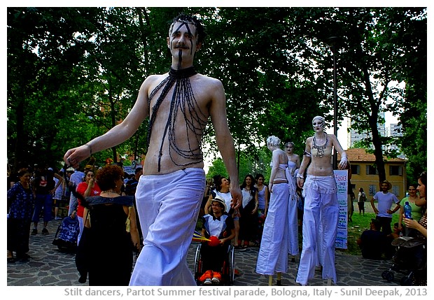 Stilt dancers, Par Tot summer parade, Bologna, Italy - images by Sunil Deepak, 2013