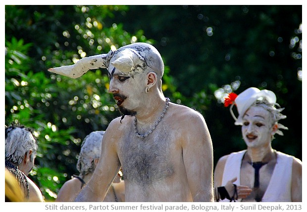 Stilt dancers, Par Tot summer parade, Bologna, Italy - images by Sunil Deepak, 2013