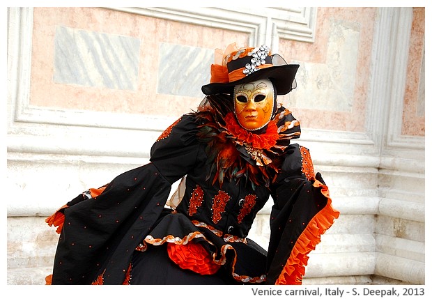 Orange and black costume at Venice carnival, Italy - S. Deepak, 2013