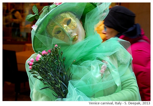 Costumes in green and pink at venice carnival, Italy - S. Deepak, 2013