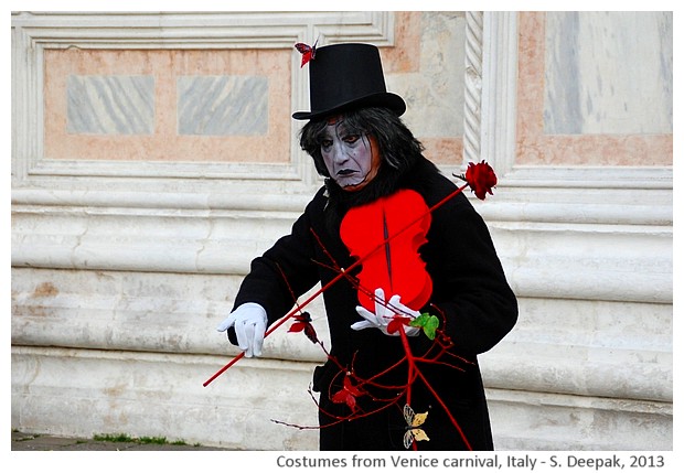 Man with red violin, Carnival, Venice, Italy - S. Deepak, 2013