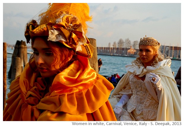 Women in white costumes, Venice carnival, Italy - images by Sunil Deepak, 2013