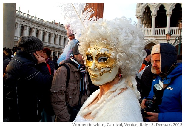 Women in white costumes, Venice carnival, Italy - images by Sunil Deepak, 2013