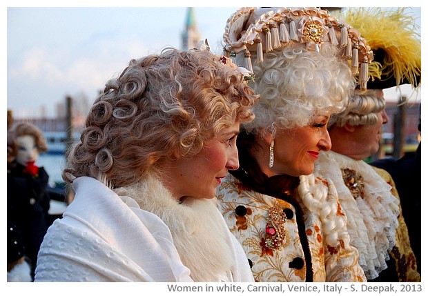 Women in white costumes, Venice carnival, Italy - images by Sunil Deepak, 2013