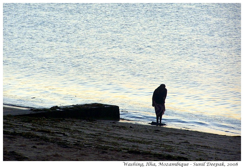 Woman washing, Ilha, Mozmabique, Africa - Images by Sunil Deepak