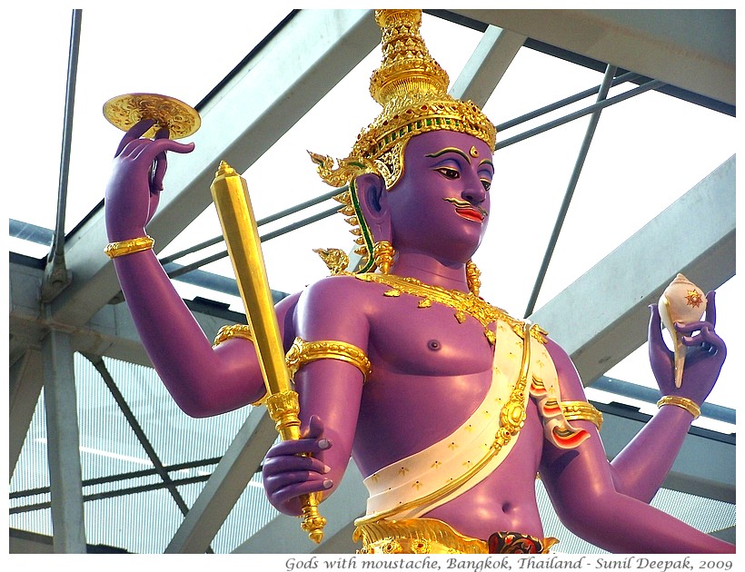 Statues of gods with moustaches, Bangkok, Thailand - Images by Sunil Deepak