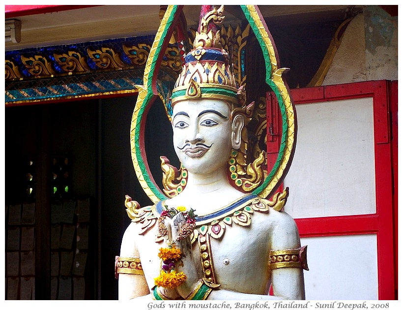 Statues of gods with moustaches, Bangkok, Thailand - Images by Sunil Deepak