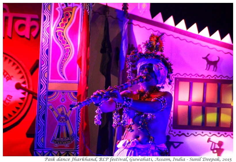 Folk dancers in blue light, Guwahati, Assam, India - Images by Sunil Deepak