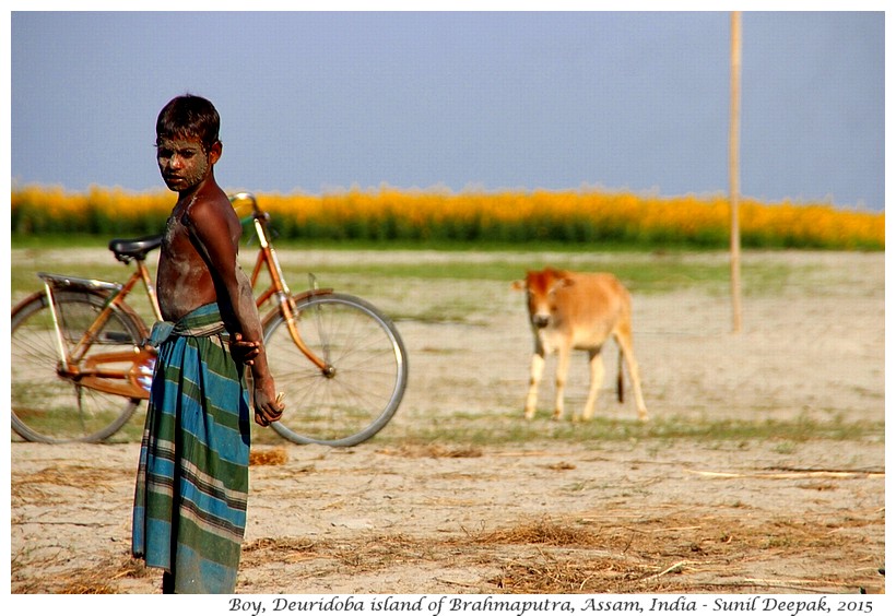 Boy on Brahmaputra's island, Assam, India - Images by Sunil Deepak