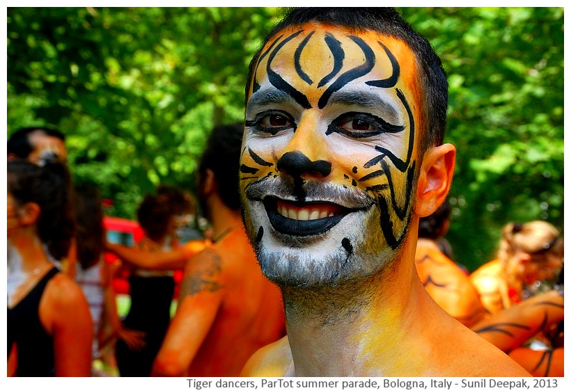 Guys in tiger makeup, Partot parade, Bologna, Italy - Images by Sunil Deepak, 2013