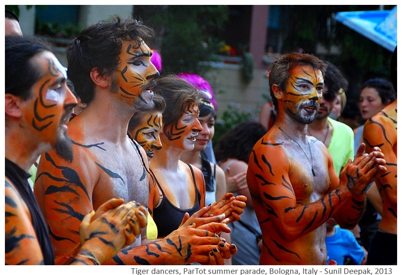 Guys in tiger makeup, Partot parade, Bologna, Italy - Images by Sunil Deepak, 2013