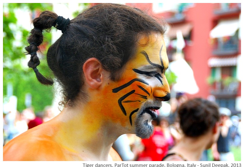 Guys in tiger makeup, Partot parade, Bologna, Italy - Images by Sunil Deepak, 2013