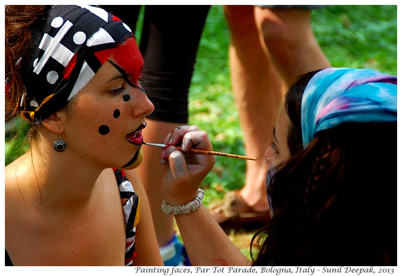 Painting faces, Par Tot parade, Bologna, Italy - Images by Sunil Deepak