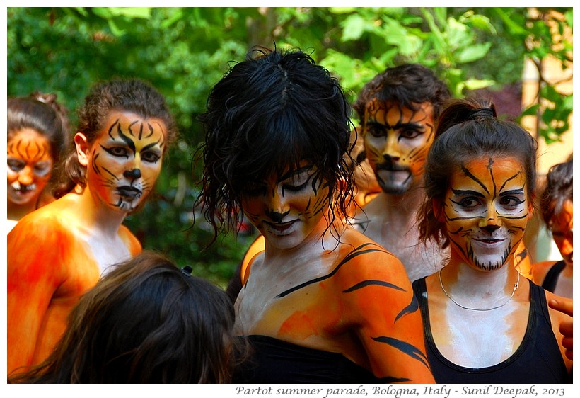 Women with tiger makeup, Par Tot parade, Bologna, Italy - Images by Sunil Deepak