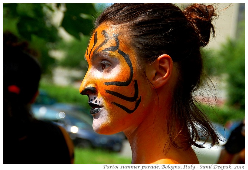 Women with tiger makeup, Par Tot parade, Bologna, Italy - Images by Sunil Deepak