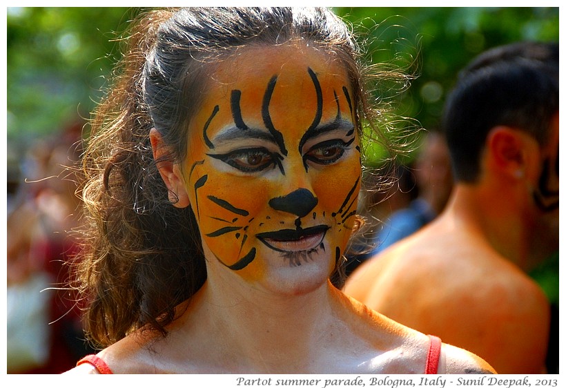 Women with tiger makeup, Par Tot parade, Bologna, Italy - Images by Sunil Deepak