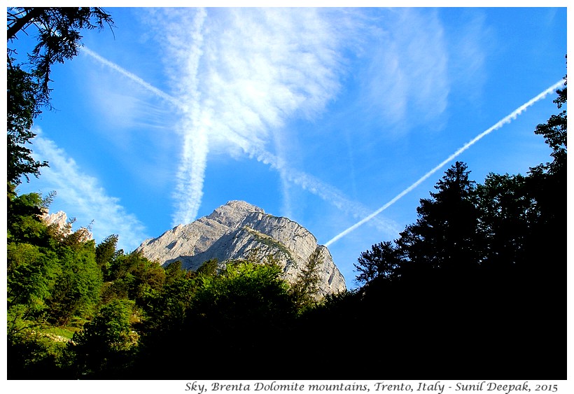 Airplane fumes in the sky, Trento, Italy - Images by Sunil Deepak