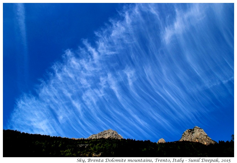 Airplane fumes in the sky, Trento, Italy - Images by Sunil Deepak
