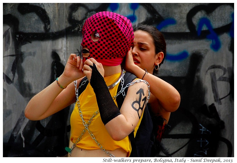 Stilt dancers prepare, Bologna, Italy - Images by Sunil Deepak